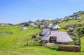 Velika planina plateau, Slovenia, Mountain village in Alps, wooden houses in traditional style, popular hiking Royalty Free Stock Photo