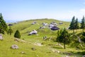 Velika planina plateau, Slovenia, Mountain village in Alps, wooden houses in traditional style, popular hiking Royalty Free Stock Photo
