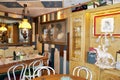 VELIKO TARNOVO, BULGARIA-OCTOBER 2019:A cozy corner in a vintage restaurant `Shtastliveca` Veliko Tarnovo, BULGARIA