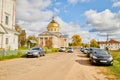 Velikoretskoe, Russia - September 15, 2019: Traditional russian church with domes and cars near it in a summer or autumn day Royalty Free Stock Photo