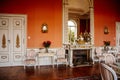 Velke Brezno, Czech Republic, 26 June 2021: chateau Velke Brezno, castle interior, baroque furniture, red dining room with open