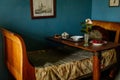 Velke Brezno, Czech Republic, 26 June 2021: chateau Velke Brezno, castle interior of blue bedroom, bed with a bedside table set