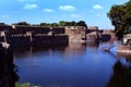 Vellore fort ornamental stone wall arches with big trench Royalty Free Stock Photo