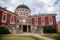 Veltrusy, Central Bohemia, Czech Republic, 5 January 2022: Rococo castle with park and garden, Romantic baroque chateau red with Royalty Free Stock Photo