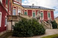 Veltrusy, Central Bohemia, Czech Republic, 5 January 2022: Rococo castle with park and garden, Romantic baroque chateau red with Royalty Free Stock Photo