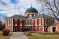 Veltrusy, Central Bohemia, Czech Republic, 5 January 2022: Rococo castle with park and garden, Romantic baroque chateau red with Royalty Free Stock Photo