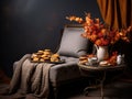 Velvet Reprieve: Chaise Lounge with Silk Cushions and Autumnal Tea Setting on a Gradient Gray Canvas Royalty Free Stock Photo
