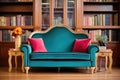 velvet settee with side book towers in a victorianstyle room Royalty Free Stock Photo