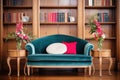 velvet settee with side book towers in a victorianstyle room Royalty Free Stock Photo