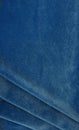 Velvet texture blue color background, expensive luxury fabric,  wallpaper. Royalty Free Stock Photo