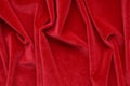 Velvet texture red color background , expensive luxury fabric,  wallpaper. Royalty Free Stock Photo