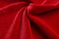 Velvet texture red color background , expensive luxury fabric,  wallpaper. Royalty Free Stock Photo