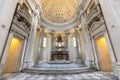 Sacred catholic altar in Baroque style and cupola. Day light - Italy
