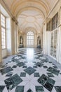 Venaria Reale, Italy - January 2023: luxury interior old royal palace. Gallery perspective with window