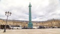 Vendome column with statue of Napoleon Bonaparte on the Place Vendome timelapse hyperlapse. Paris, France. Royalty Free Stock Photo