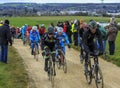 The Peloton on a Dirty Road - Paris-Nice 2016