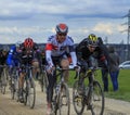 The Peloton on a Dirty Road - Paris-Nice 2016