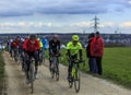 The Peloton on a Dirty Road - Paris-Nice 2016