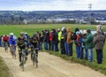 The Peloton on a Dirty Road - Paris-Nice 2016 Royalty Free Stock Photo