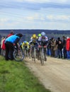 The Peloton on a Dirty Road - Paris-Nice 2016