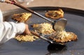 Crisp Fried Mussels Pancake Thai food on a large iron pan Royalty Free Stock Photo