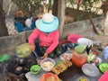 A vendor cooking street foods in Dalat, Lam Dong, Vietnam Royalty Free Stock Photo