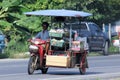 Vendor of kind of Thai food on a motorcycle