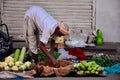 A vendor organizes his vegetables in Jaipur, India. Royalty Free Stock Photo