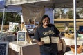 A vendor promotes a line of all-natural bath and body products for sensitive skin at a market in Athens, Georgia