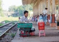 Vendor at a railway station in Yangon, Myanmar.