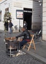 Vendor of roasted chestnuts in Rome, Italy