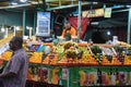 A vendor selling fresh squeezed juice in the outdoor Marekesh, Morocco.