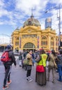 Vendor selling magazines to customers in Melbourne