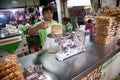 Vendor selling maize tortillas on a local market in Merida, Yu