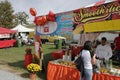 Vendor selling refreshments to attendee at the Richmond Folk Festival in Virginia