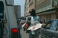 A vendor selling in a street in Angola.