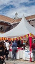 Vendor stalls in the courtyard of an historic building