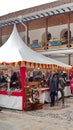 Vendor stalls in the courtyard of an historic building