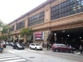 Vendors and customers in Reading Terminal Market entrance, Philadelphia