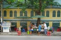 Vendors prepare traditional street food