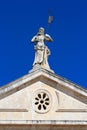 Venetian architecture and detail of church facade in Perast