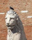 Venetian Arsenal, old shipyard, stone lion, Venice, Italy Royalty Free Stock Photo