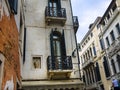 Balconies in the narrow streets in Venice Italy