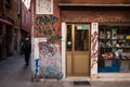 Venetian backstreet shop with Grafitti