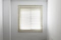 Venetian blinds in a white empty room