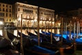 Venetian Canal at night with Gondolas. Sightseeing in Venice, Italy Royalty Free Stock Photo