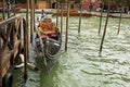 Venetian canal in Venice with an elegant gondola. view
