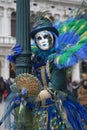 Yearly Venice Carnival where people wear a wonderful Carnival costume and mask