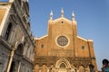 The Venetian churches. Facades, frontons, roofs and belfries Royalty Free Stock Photo