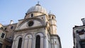 The Venetian churches. Facades, frontons, roofs and belfries Royalty Free Stock Photo